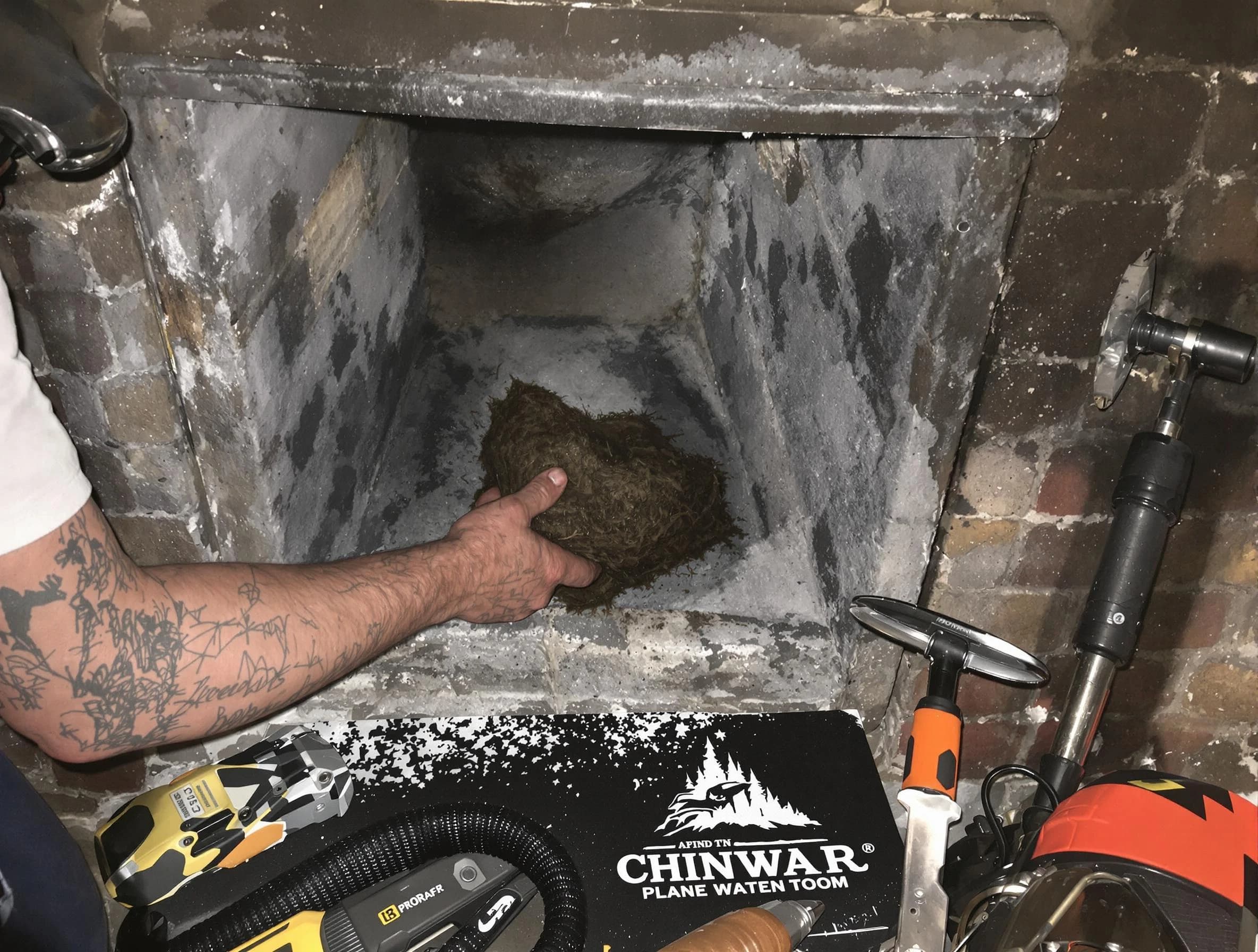 Meadowbrook Chimney Sweep safely removing debris and screening chimney in Meadowbrook, AL